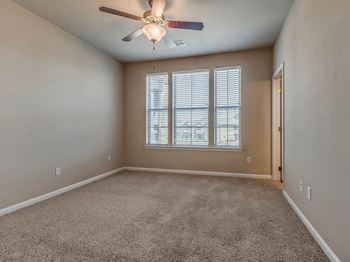 Carpeted Bedroom with Large Window